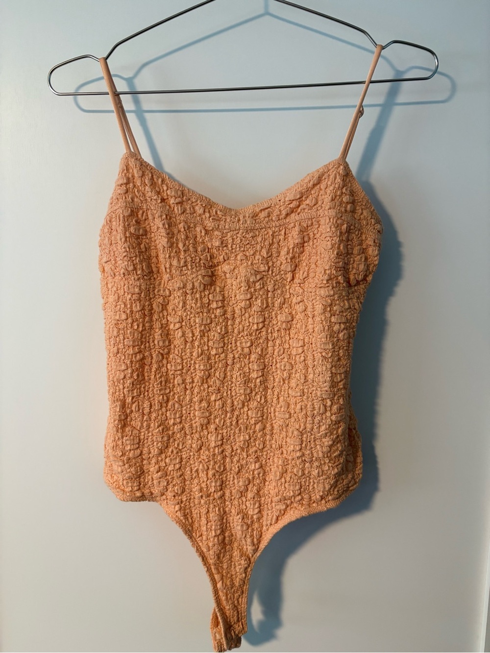 Cute smocked Elodie Textured Peach bodysuit beach vibes vacation inspired
